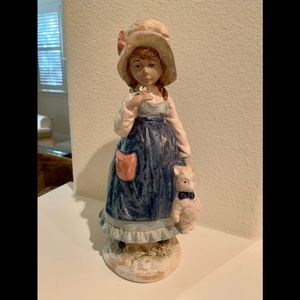 Vintage Nadal girl holding teddy bear